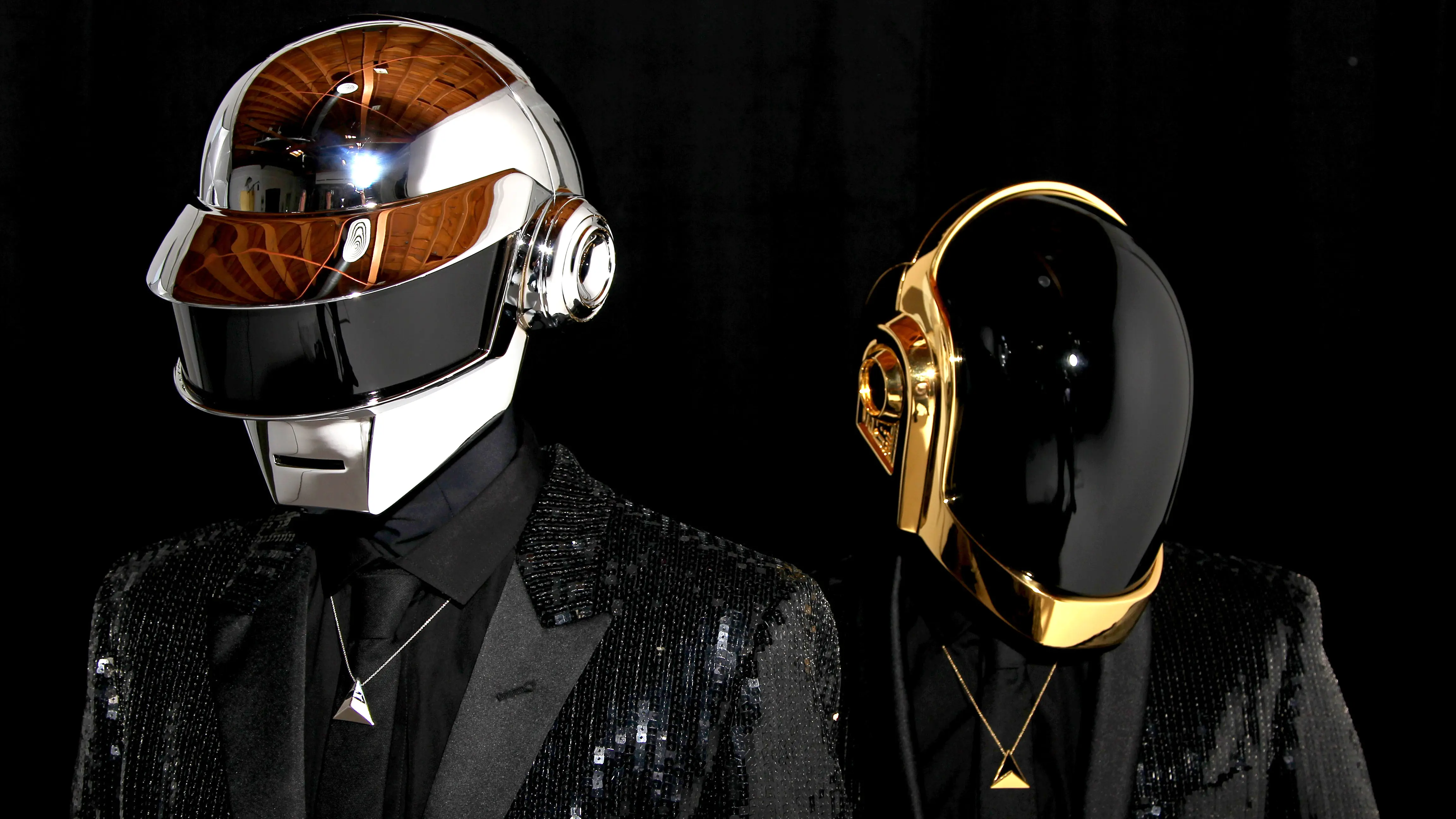 Daft Punk in their iconic robot helmets